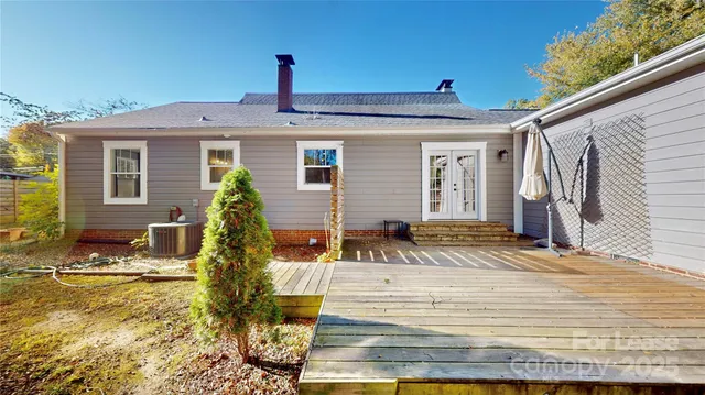 a view of road with large trees