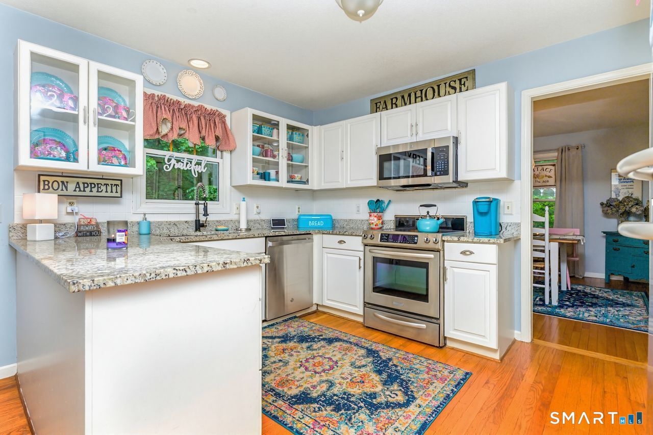 73 Long Hill Road Deep River, CT 06417 - Photo 12 of 40 Coastal White Cabinets, Granite Counters And Stainless Steel Appliances