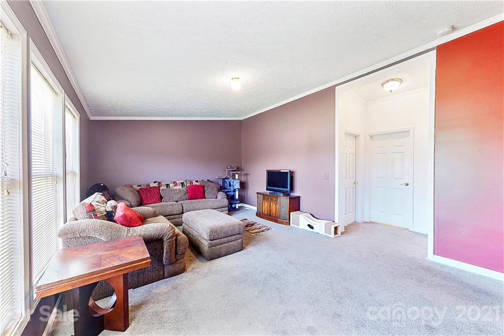 4407 Wolf Pond Road Monroe, NC 28112 - Photo 5 of 26 a living room with furniture