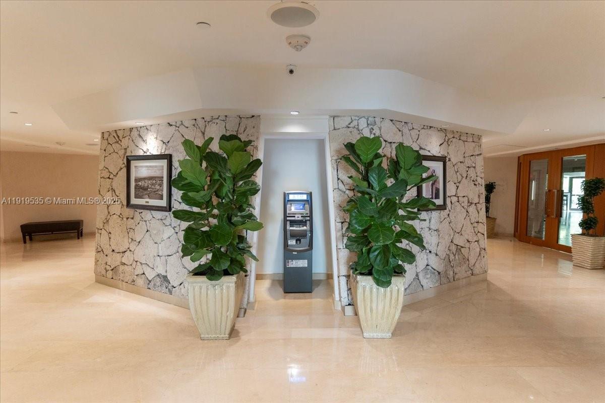 1121 Crandon Boulevard, Unit E304 Key Biscayne, FL 33149 - Photo 14 of 17 a view of entryway with livingroom