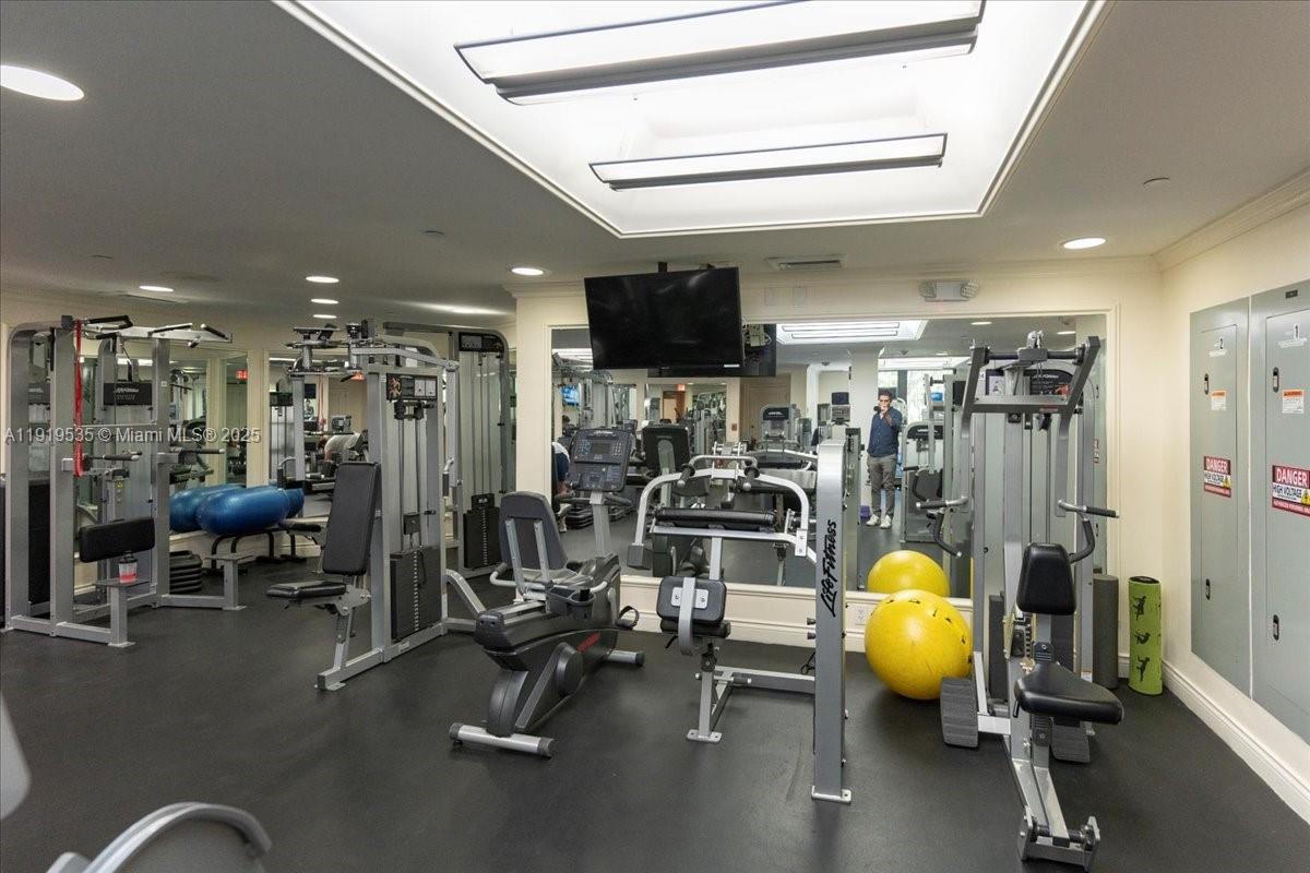 1121 Crandon Boulevard, Unit E304 Key Biscayne, FL 33149 - Photo 15 of 17 a view of a room with gym equipment