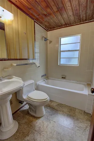 a bathroom with a sink and a toilet