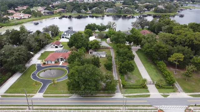 an aerial view of a residential houses and lake view