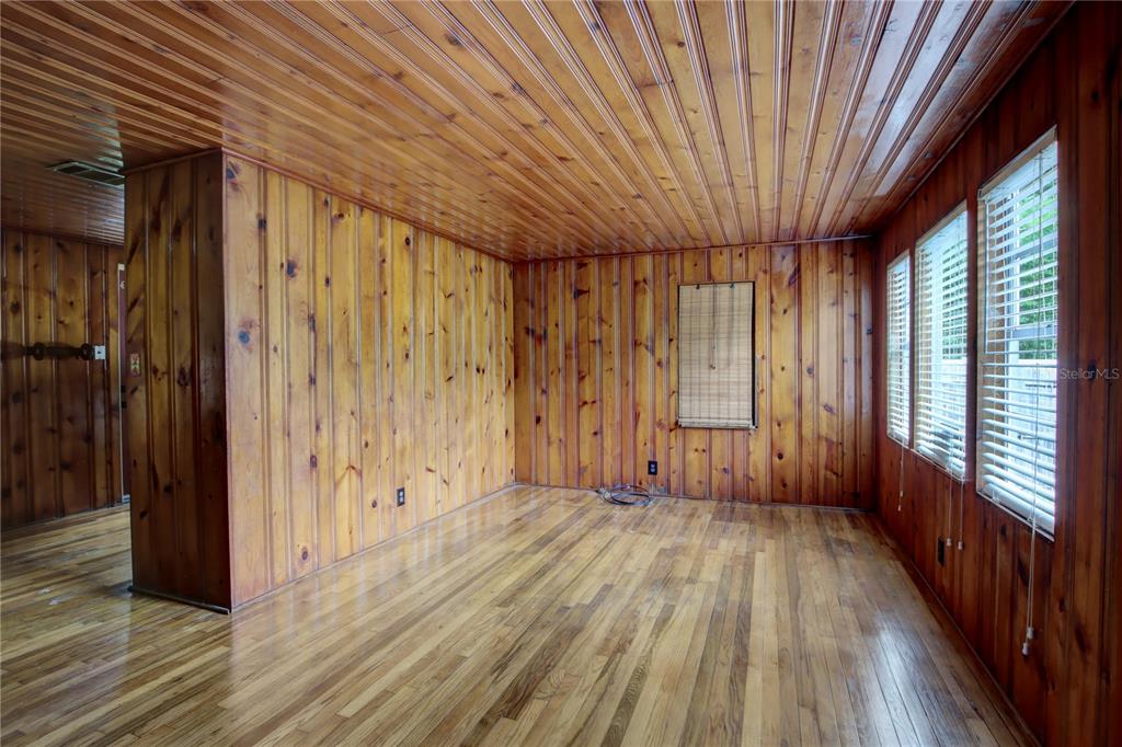 1870 Lake Markham Road Sanford, FL 32771 - Photo 10 of 23 a view of a room with wooden floor and brick walls