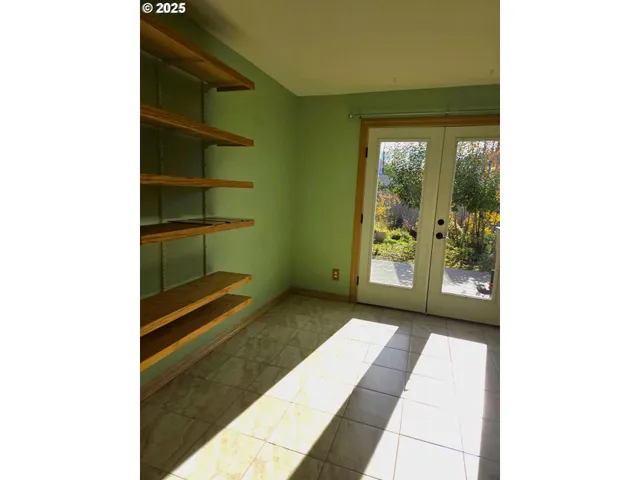 a view of a room with rack on the wall