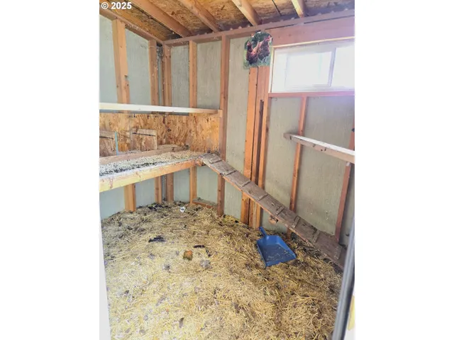 a view of a bathroom with a sink and a mirror