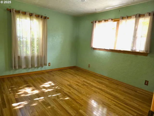 a view of a room with a large window