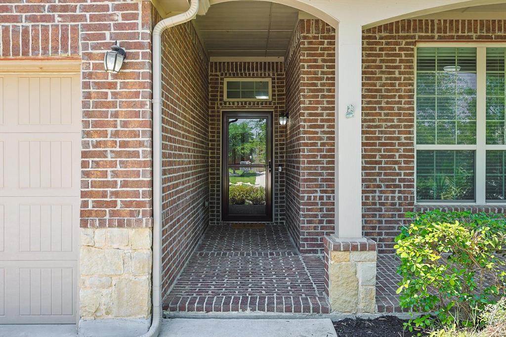 1300 Meadowlakes Drive Azle, TX 76020 - Photo 1 of 39 a view of a door of a house with a window