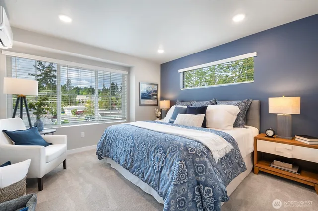 a bed room with a bed and a couch