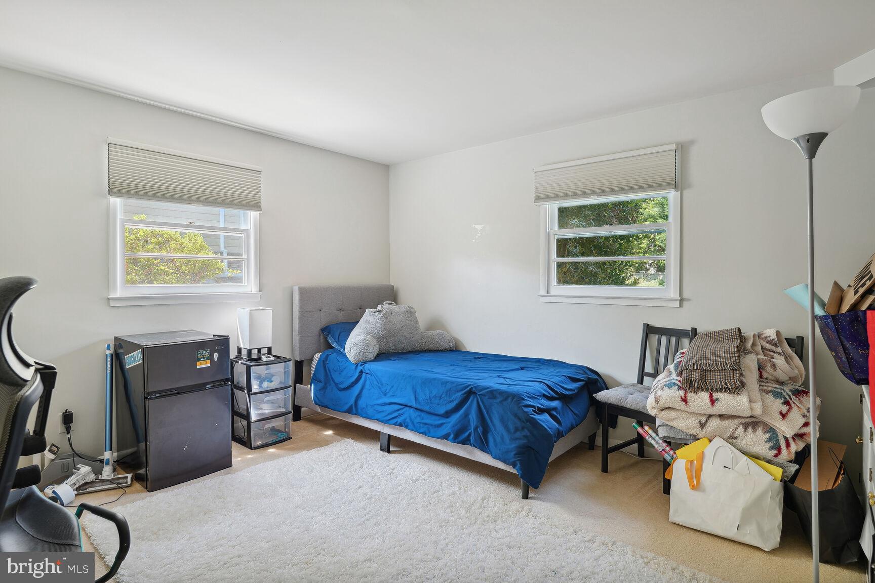 7011 Hector Road McLean, VA 22101 - Photo 11 of 20 a bedroom with furniture and a window