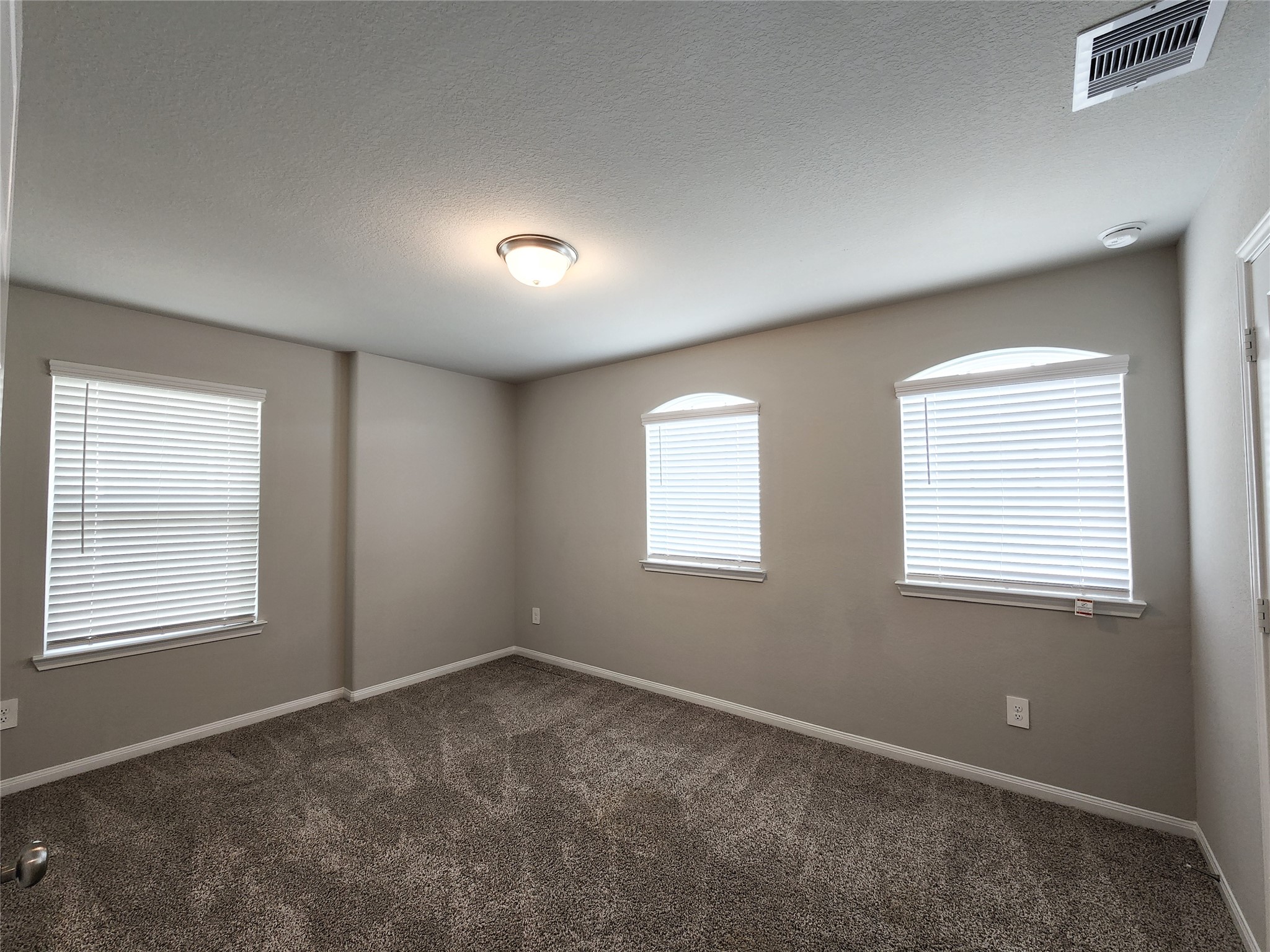 10714 Clfs Vw Drive Rosharon, TX 77583 - Photo 15 of 30 a view of an empty room with a window
