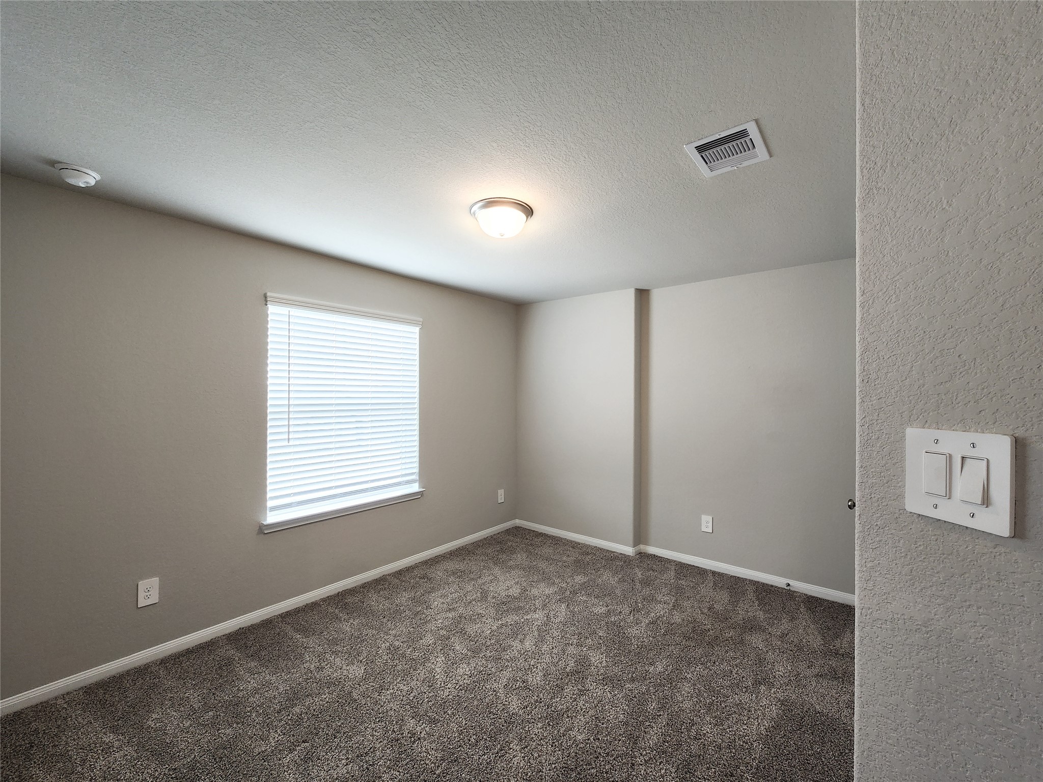 10714 Clfs Vw Drive Rosharon, TX 77583 - Photo 17 of 30 an empty room with a window