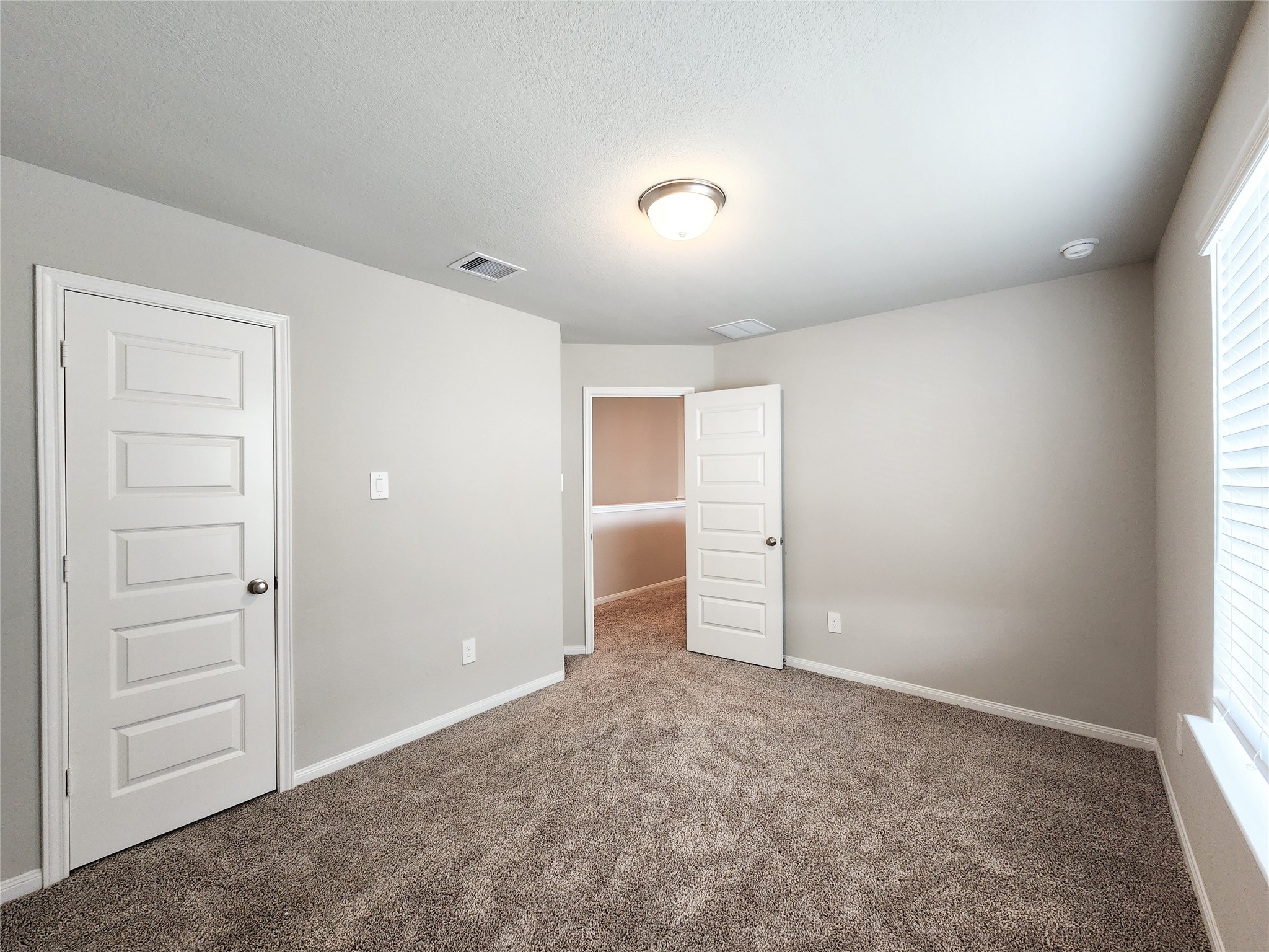 10714 Clfs Vw Drive Rosharon, TX 77583 - Photo 18 of 30 an empty room with closet and bathroom