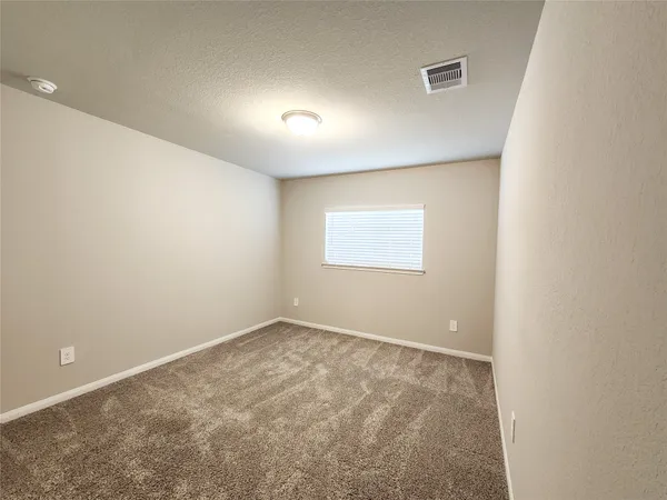 an empty room with a workbench