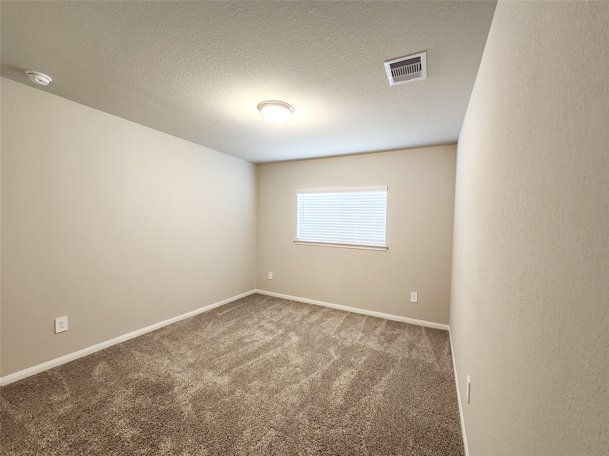 10714 Clfs Vw Drive Rosharon, TX 77583 - Photo 28 of 30 an empty room with a workbench