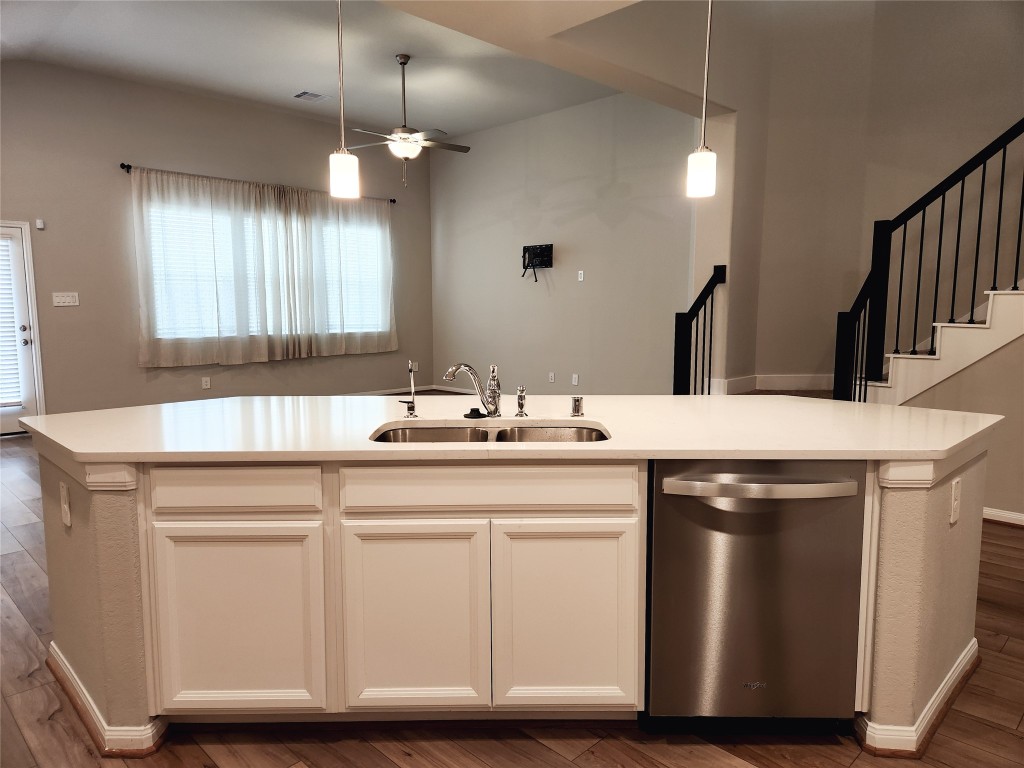 10714 Clfs Vw Drive Rosharon, TX 77583 - Photo 6 of 30 a sink with white cabinets