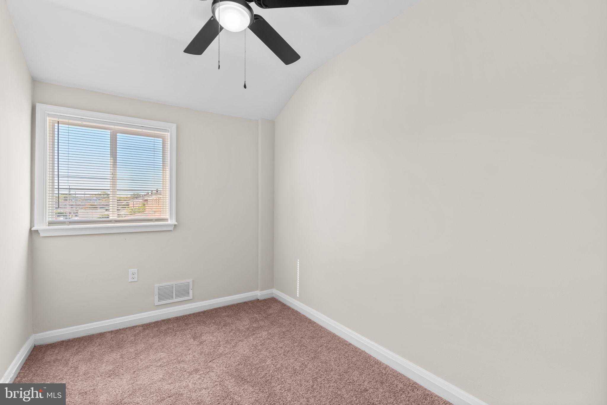 2735 Moorgate Road Dundalk, MD 21222 - Photo 16 of 35 a view of an empty room with a window