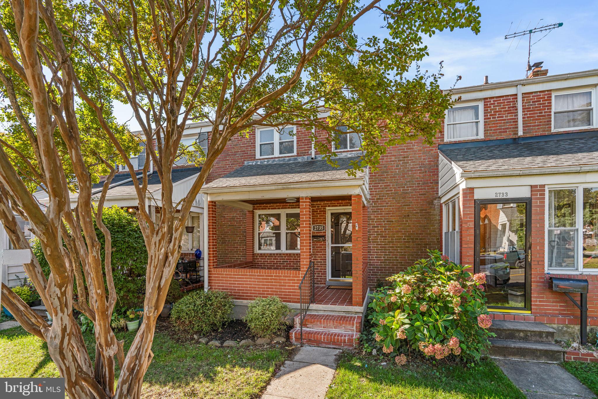 2735 Moorgate Road Dundalk, MD 21222 - Photo 2 of 35 a front view of a house with a garden
