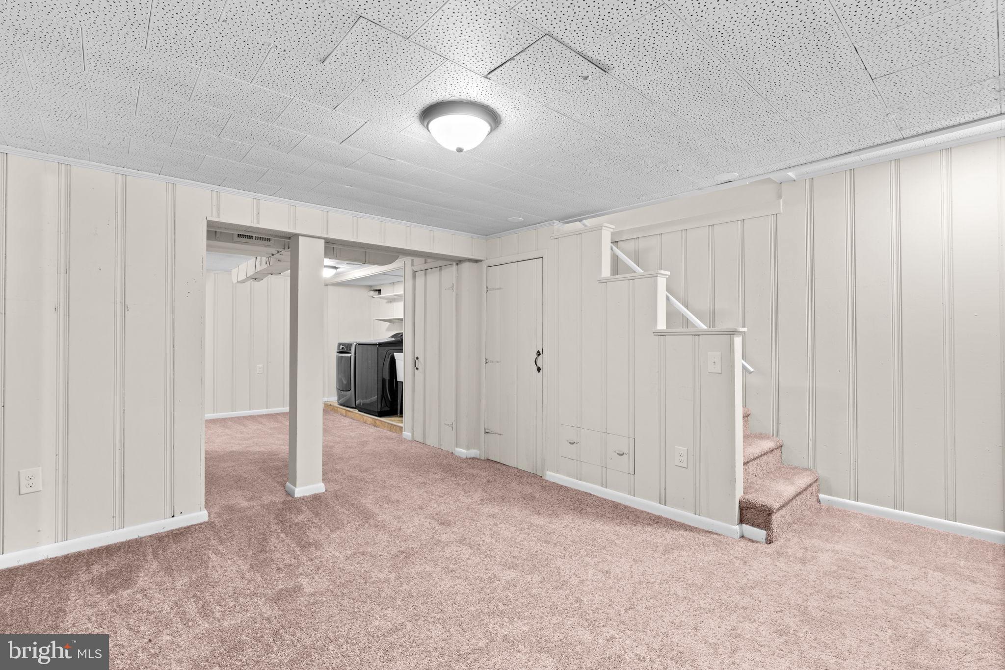 2735 Moorgate Road Dundalk, MD 21222 - Photo 25 of 35 an empty room with a ceiling fan and entryway