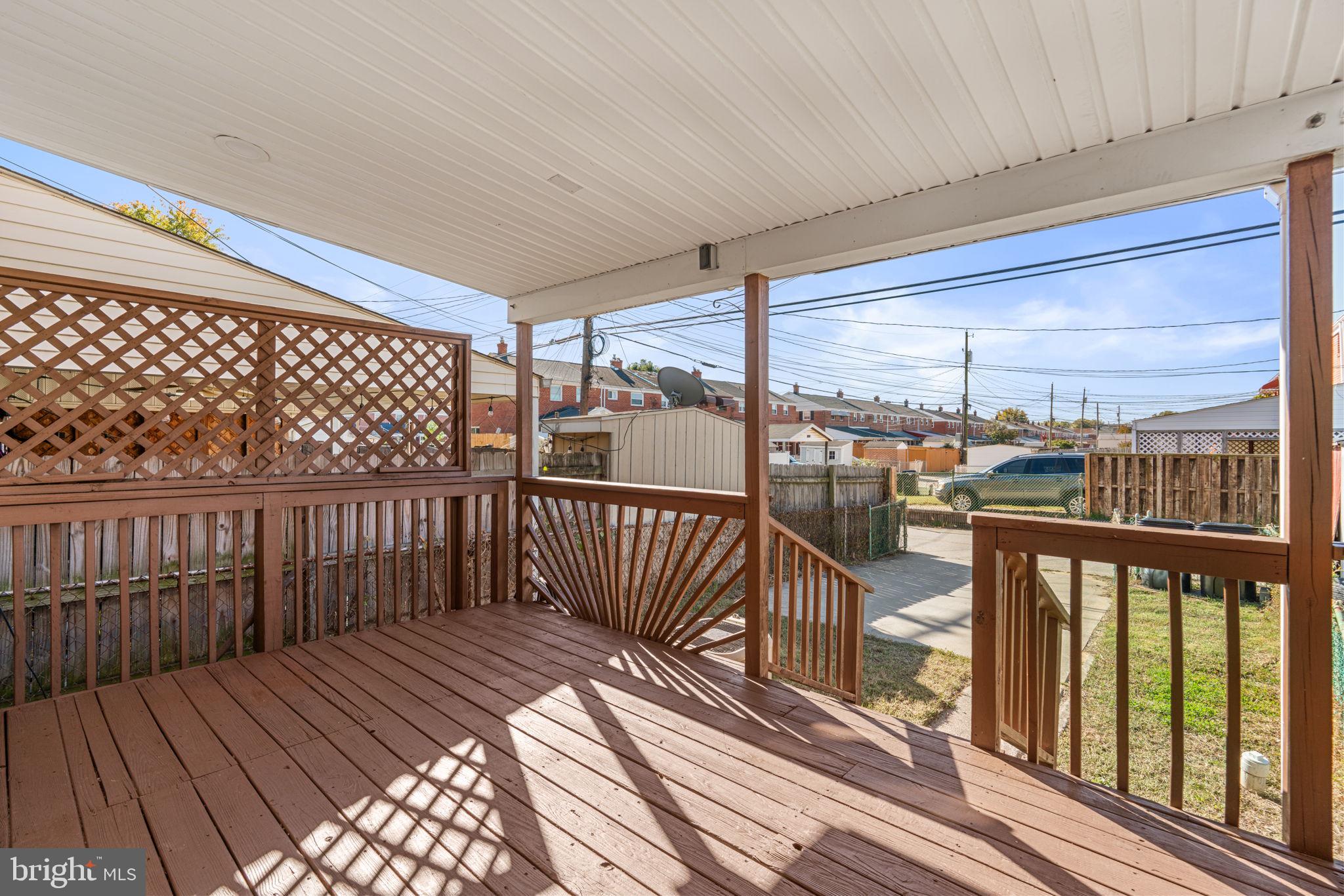 2735 Moorgate Road Dundalk, MD 21222 - Photo 31 of 35 a view of a balcony with wooden floor