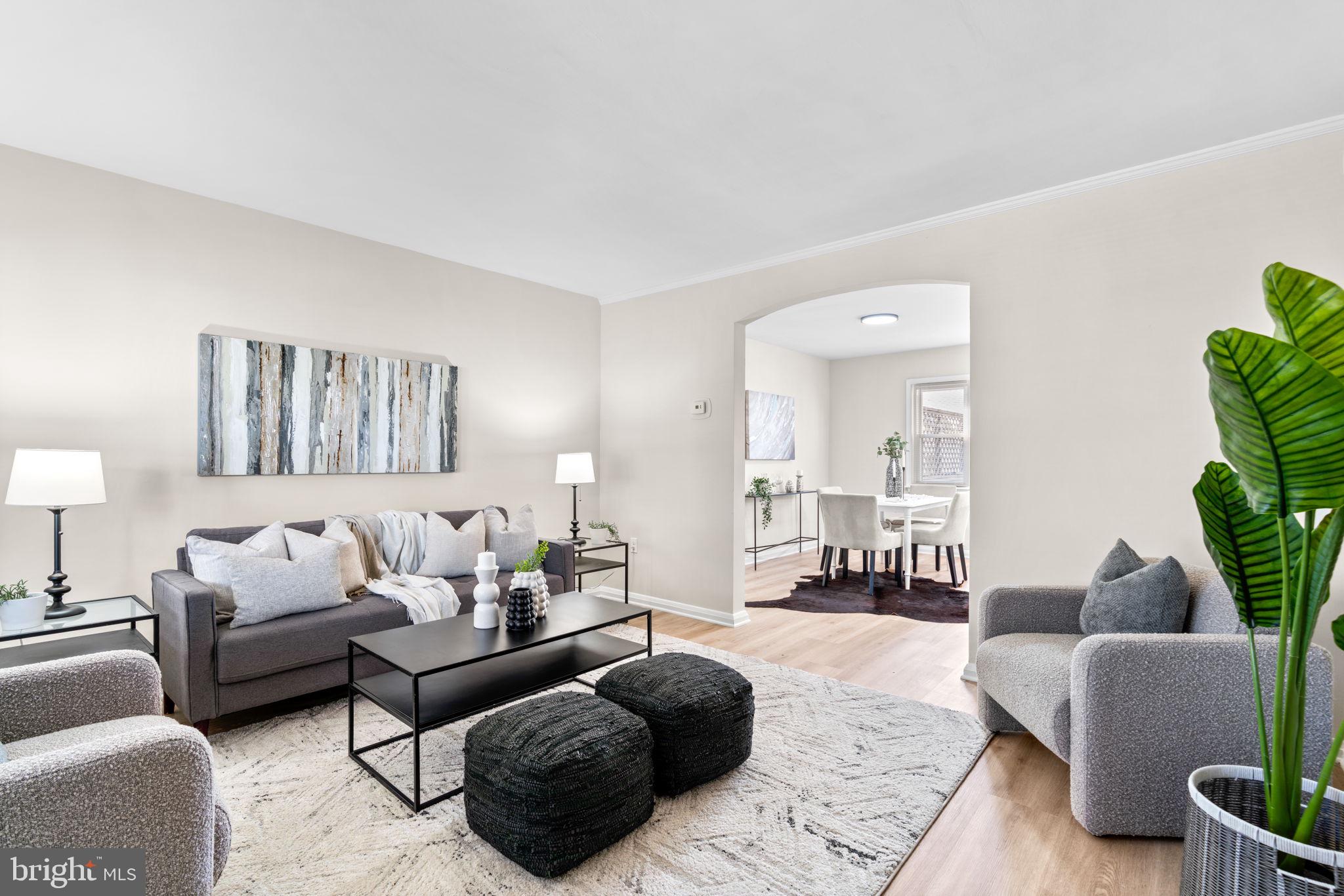 2735 Moorgate Road Dundalk, MD 21222 - Photo 5 of 35 a living room with furniture and a large window