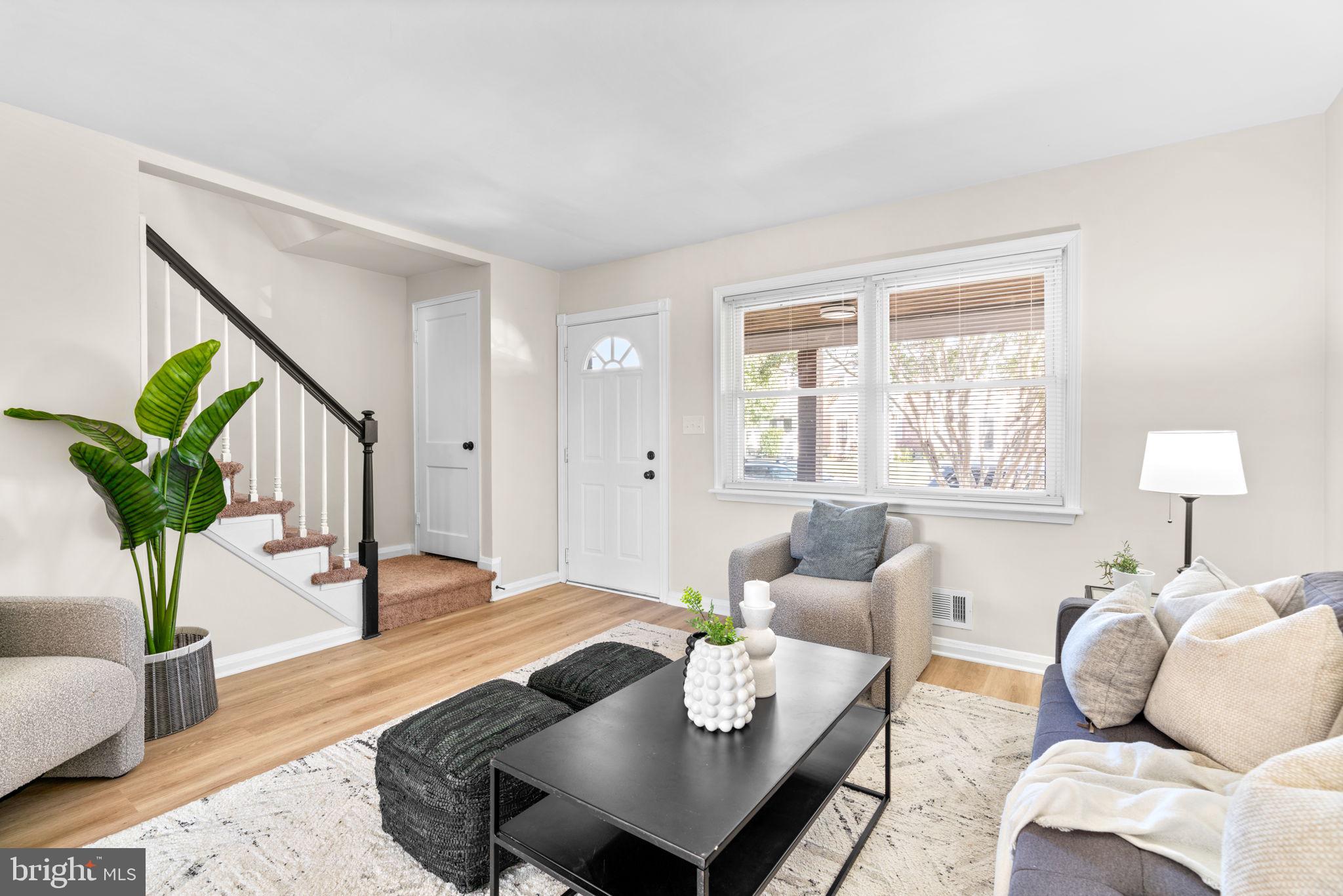 2735 Moorgate Road Dundalk, MD 21222 - Photo 7 of 35 a living room with furniture potted plant and a window