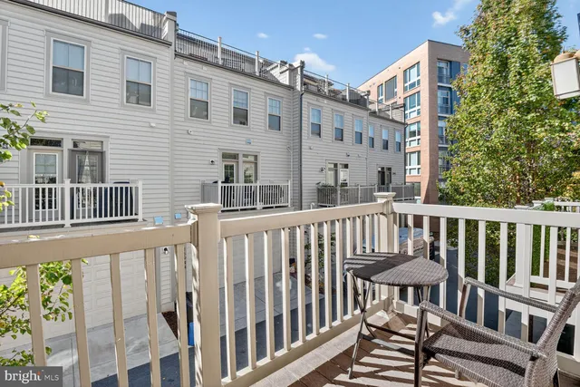 a view of a chair and table and chair in the balcony
