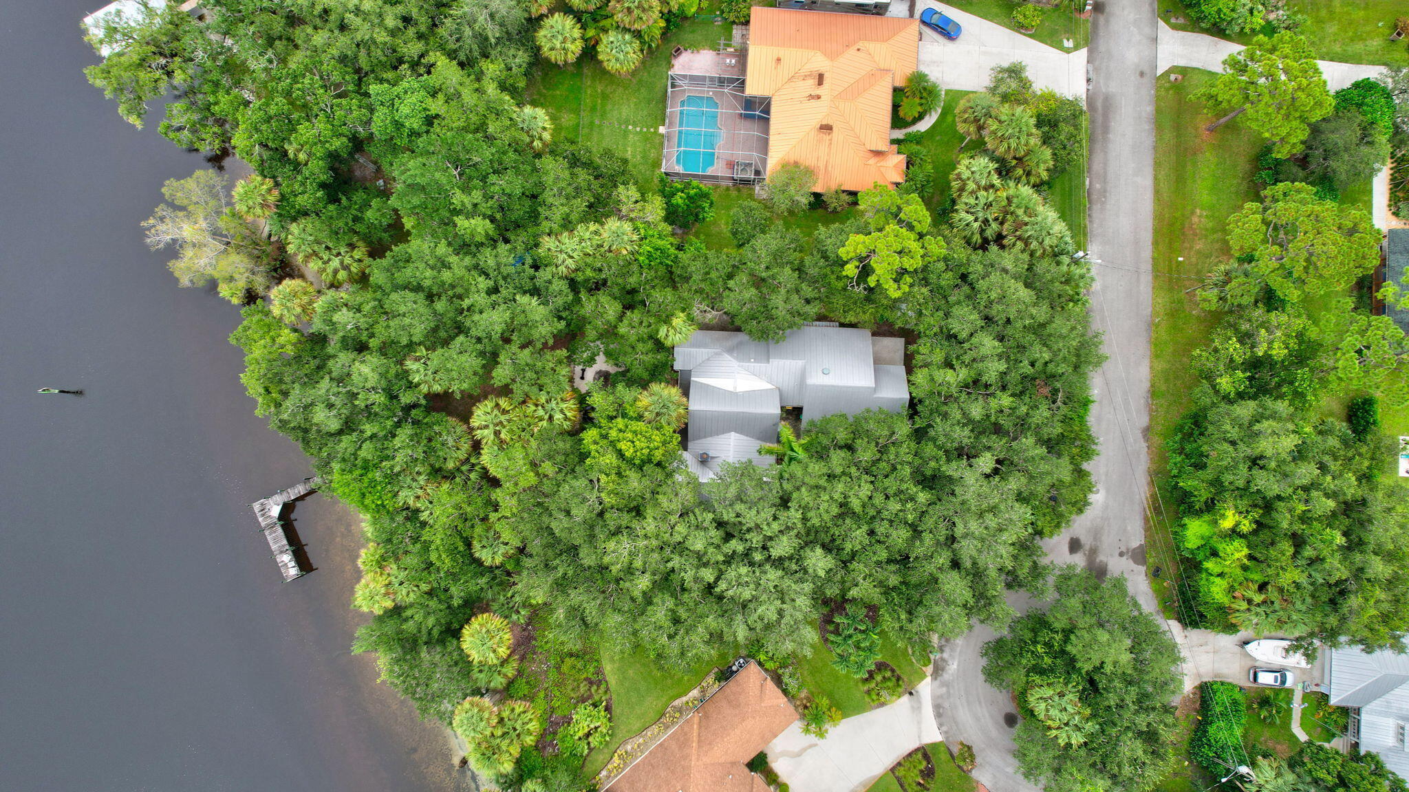 1055 Southwest Blue Water Way Stuart, FL 34997 - Photo 1 of 67 61-web-or-mls-DJI_0227_28_29_30_31