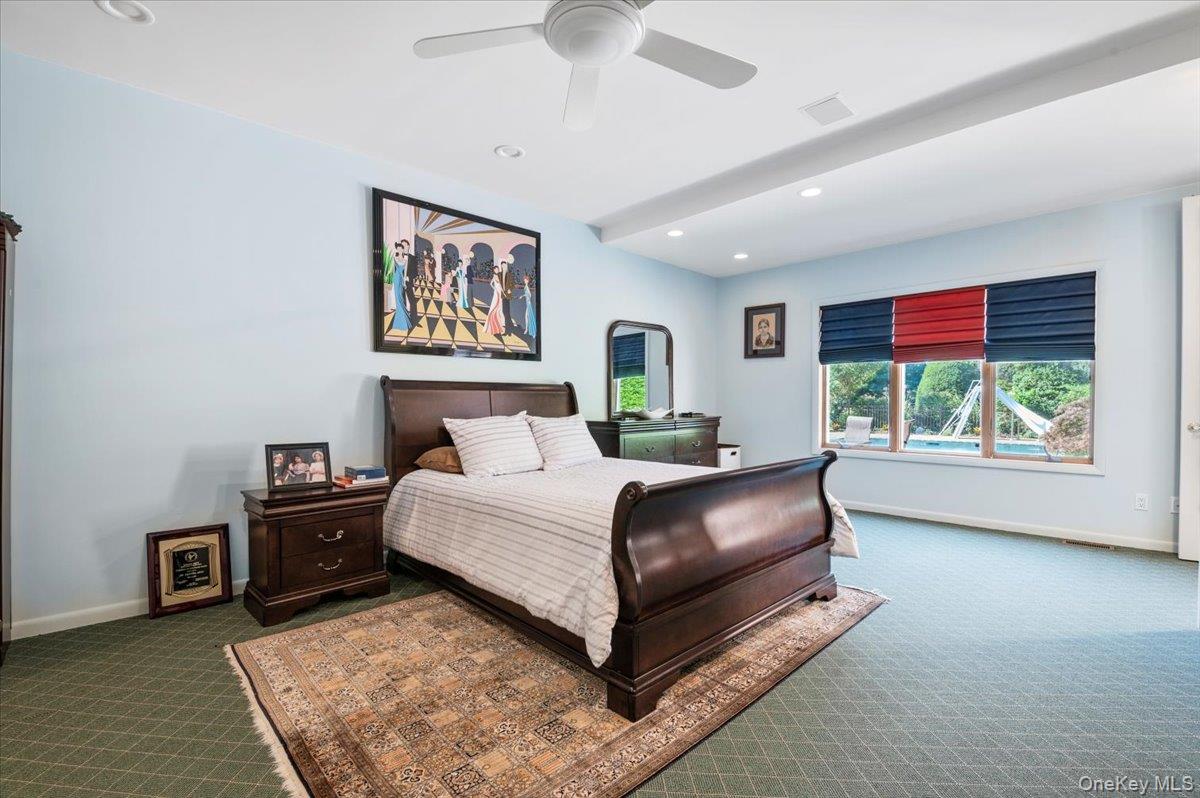 12 Ridge Court Glen Head, NY 11545 - Photo 18 of 46 Carpeted bedroom featuring recessed lighting and a ceiling fan