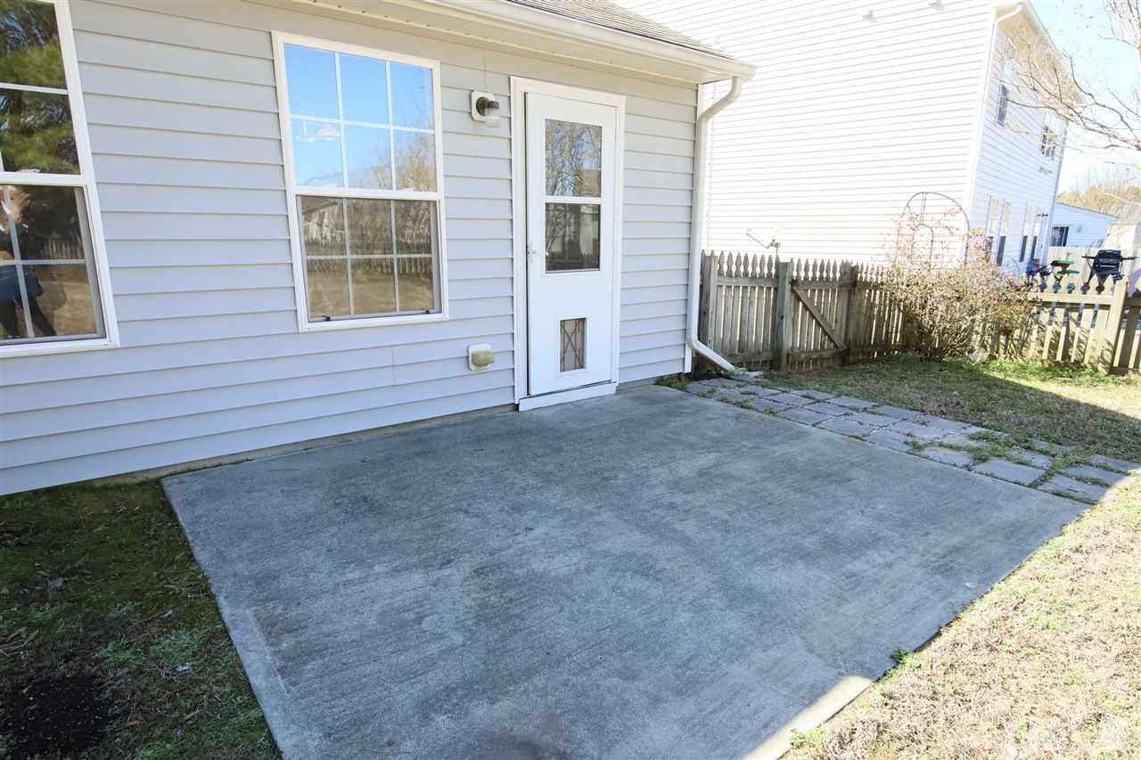 3609 Watkins Ridge Court Raleigh, NC 27616 - Photo 26 of 27 a view of backyard with large windows