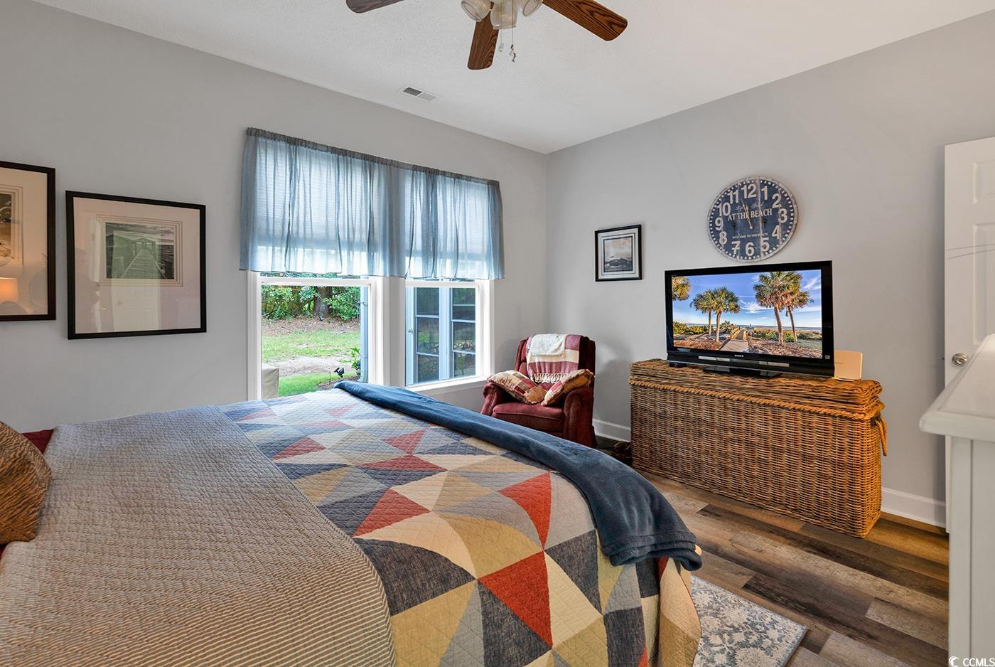 112 Coldstream Cove Loop, Unit 303 Murrells Inlet, SC 29576 - Photo 12 of 39 Bedroom with hardwood / wood-style flooring and ce