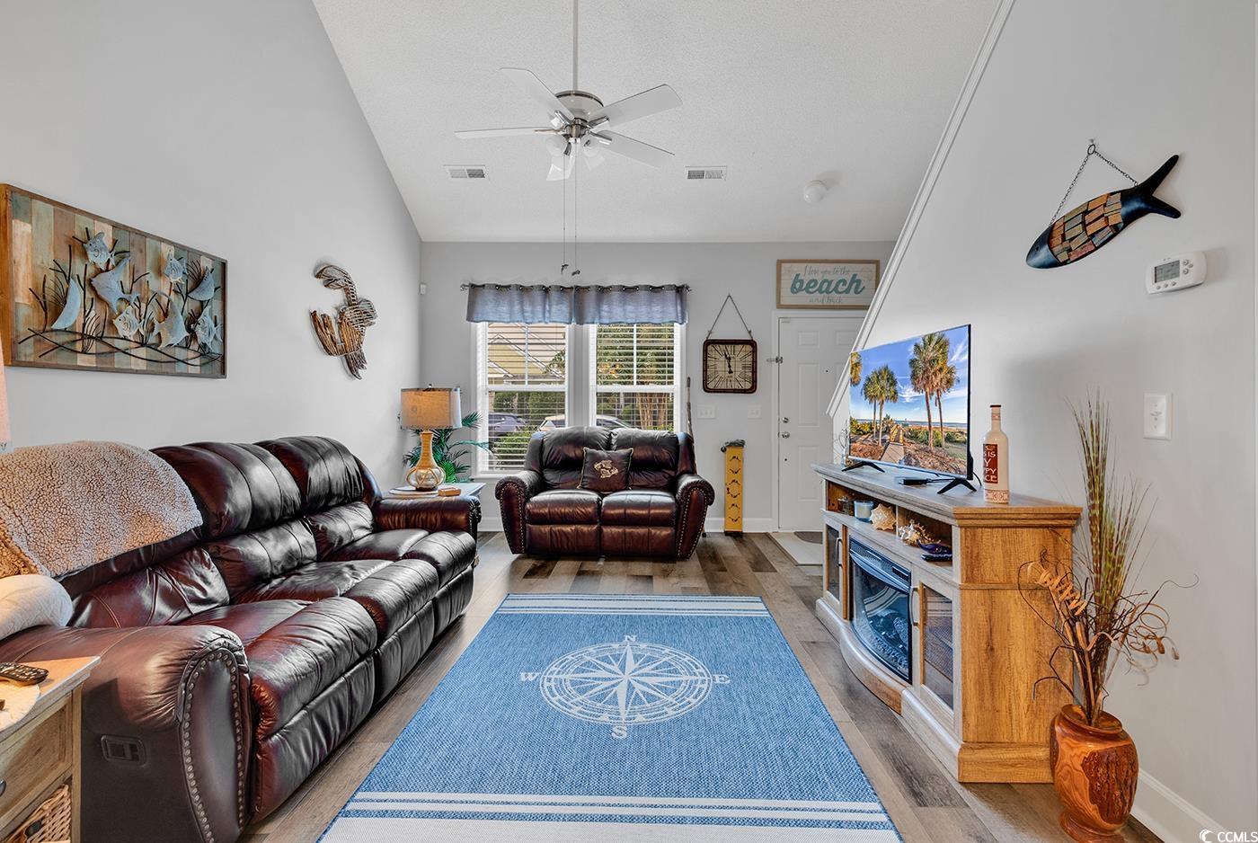 112 Coldstream Cove Loop, Unit 303 Murrells Inlet, SC 29576 - Photo 31 of 39 Living room with lofted ceiling, ceiling fan, hard