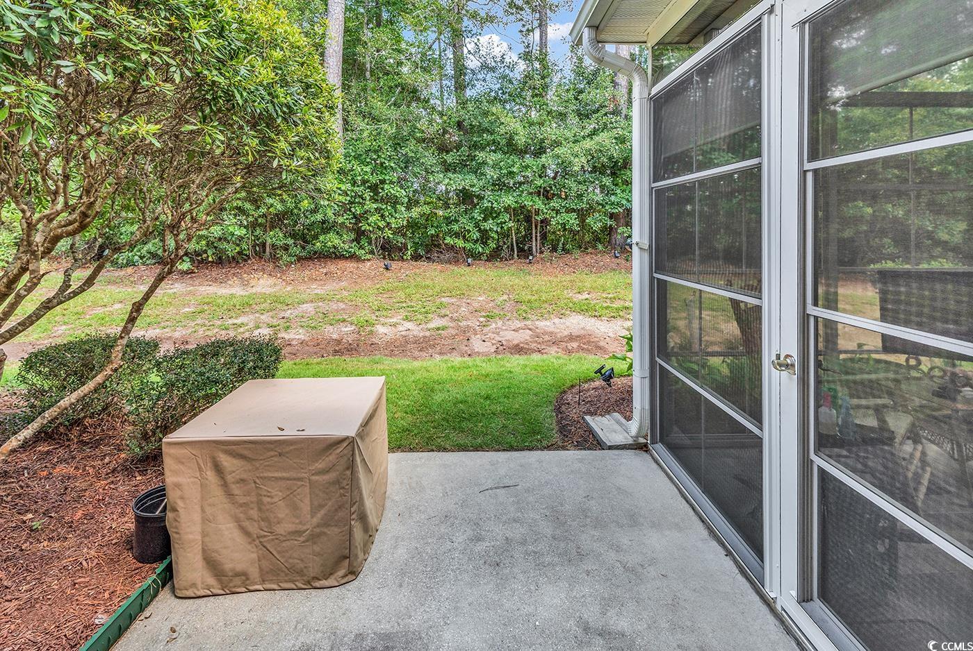 112 Coldstream Cove Loop, Unit 303 Murrells Inlet, SC 29576 - Photo 33 of 39 Exterior space featuring a patio area