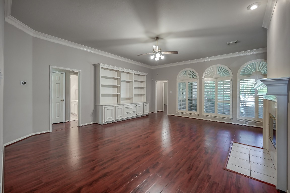 3510 Ash Glen Drive Spring, TX 77388 - Photo 12 of 39 a view of a room with wooden floors swimming pool and windows
