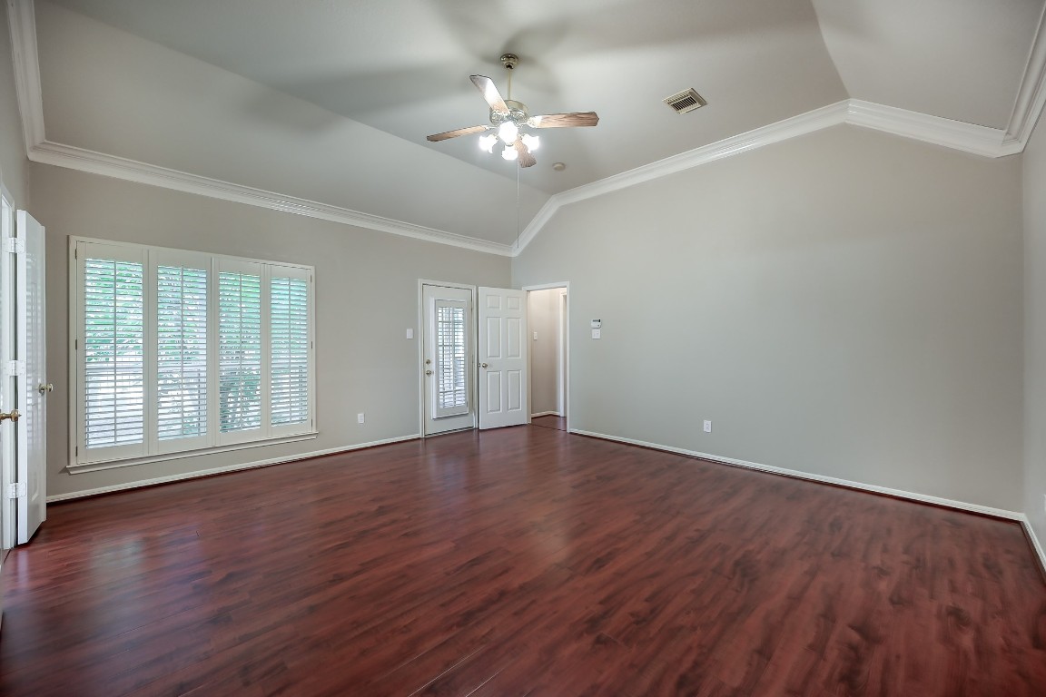 3510 Ash Glen Drive Spring, TX 77388 - Photo 22 of 39 a view of an empty room with wooden floor and a window