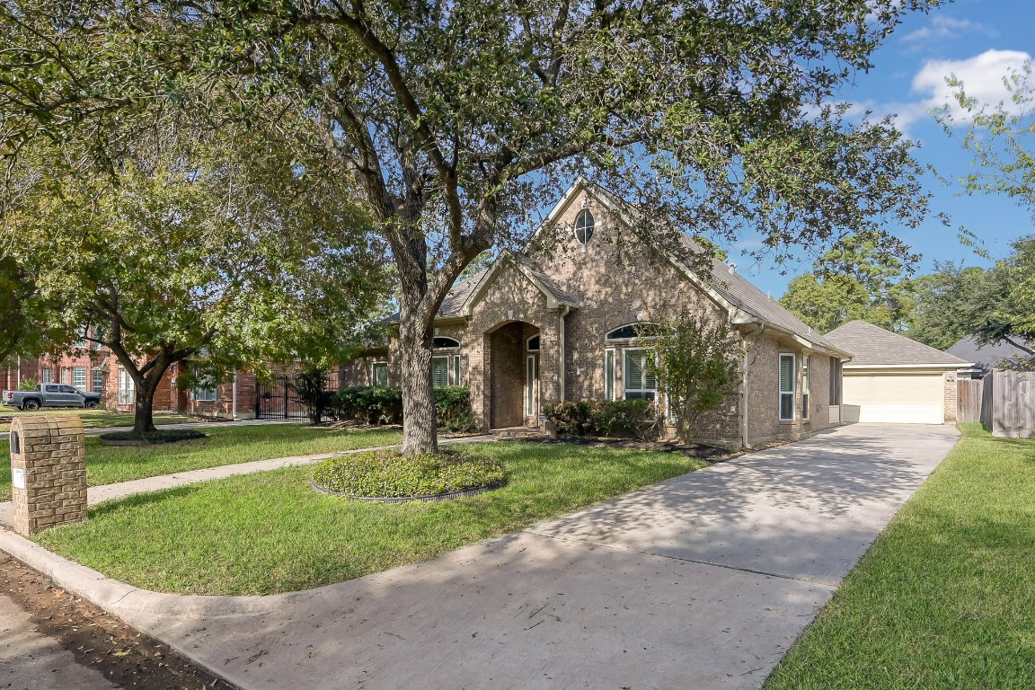 3510 Ash Glen Drive Spring, TX 77388 - Photo 3 of 39 a front view of a house with a yard and trees