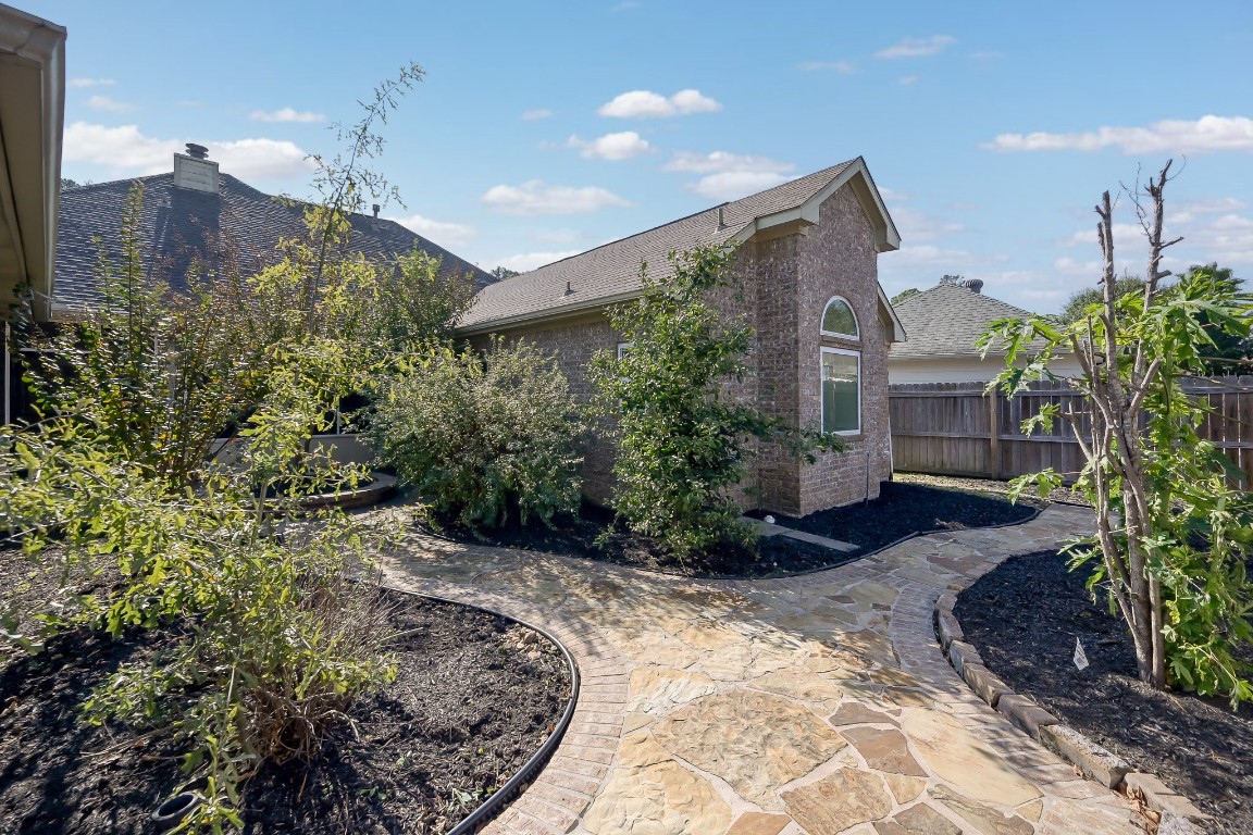 3510 Ash Glen Drive Spring, TX 77388 - Photo 37 of 39 a view of a house with a yard and potted plants