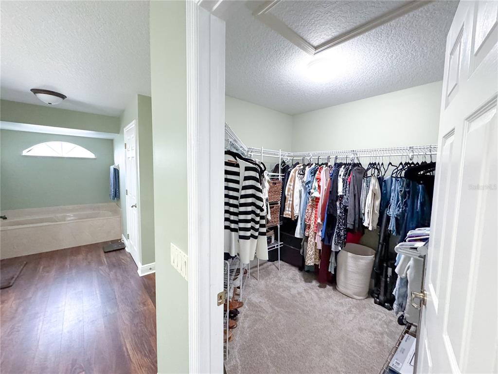 6282 Northeast 61st Ave Road Silver Springs, FL 34488 - Photo 16 of 73 a view of a walk in closet