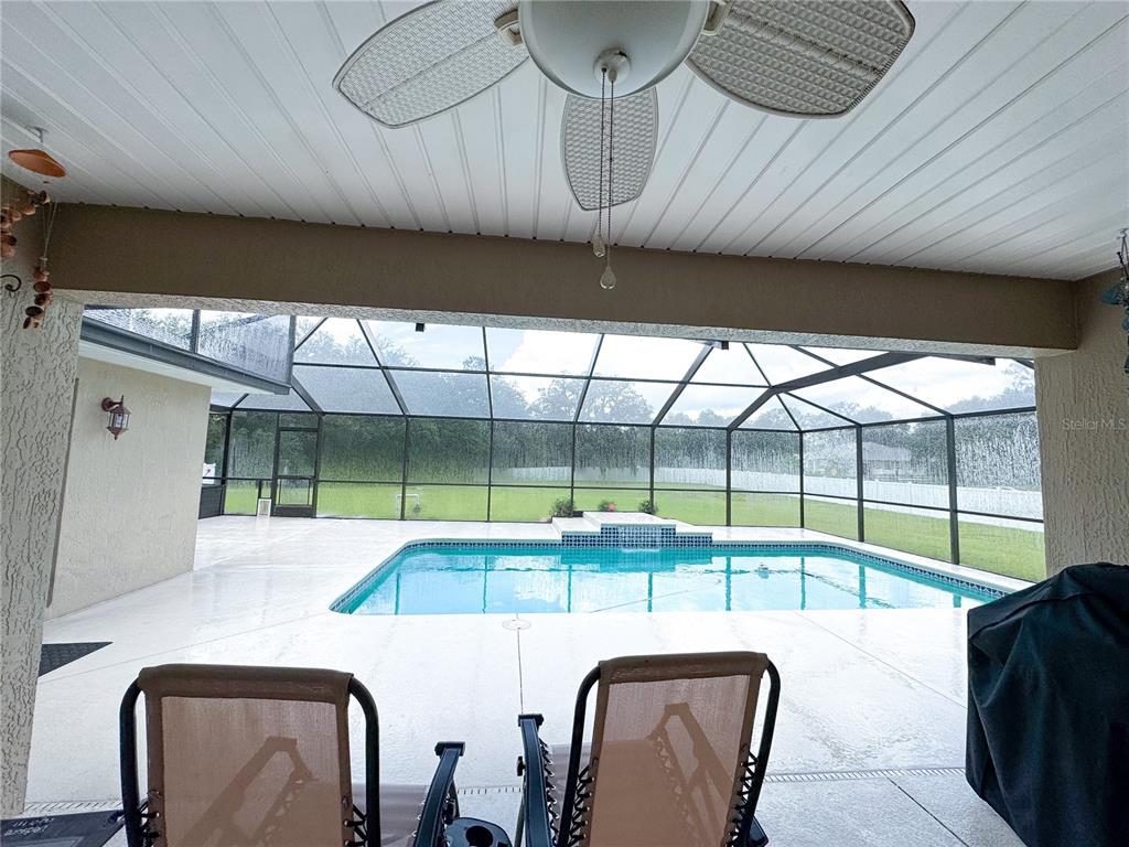 6282 Northeast 61st Ave Road Silver Springs, FL 34488 - Photo 62 of 73 a room with furniture and a large window