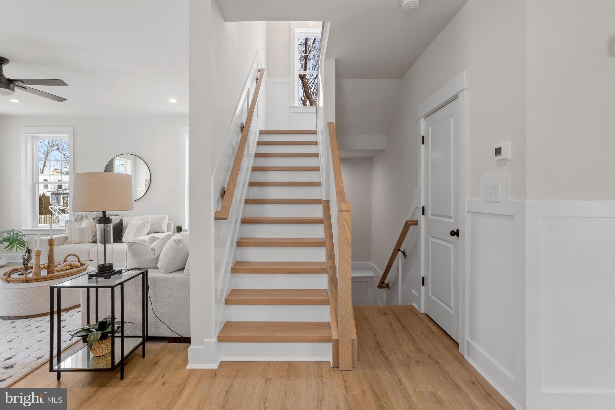 406 Midway Riverton, NJ 08077 - Photo 20 of 30 a view of entryway with wooden floor and stairs