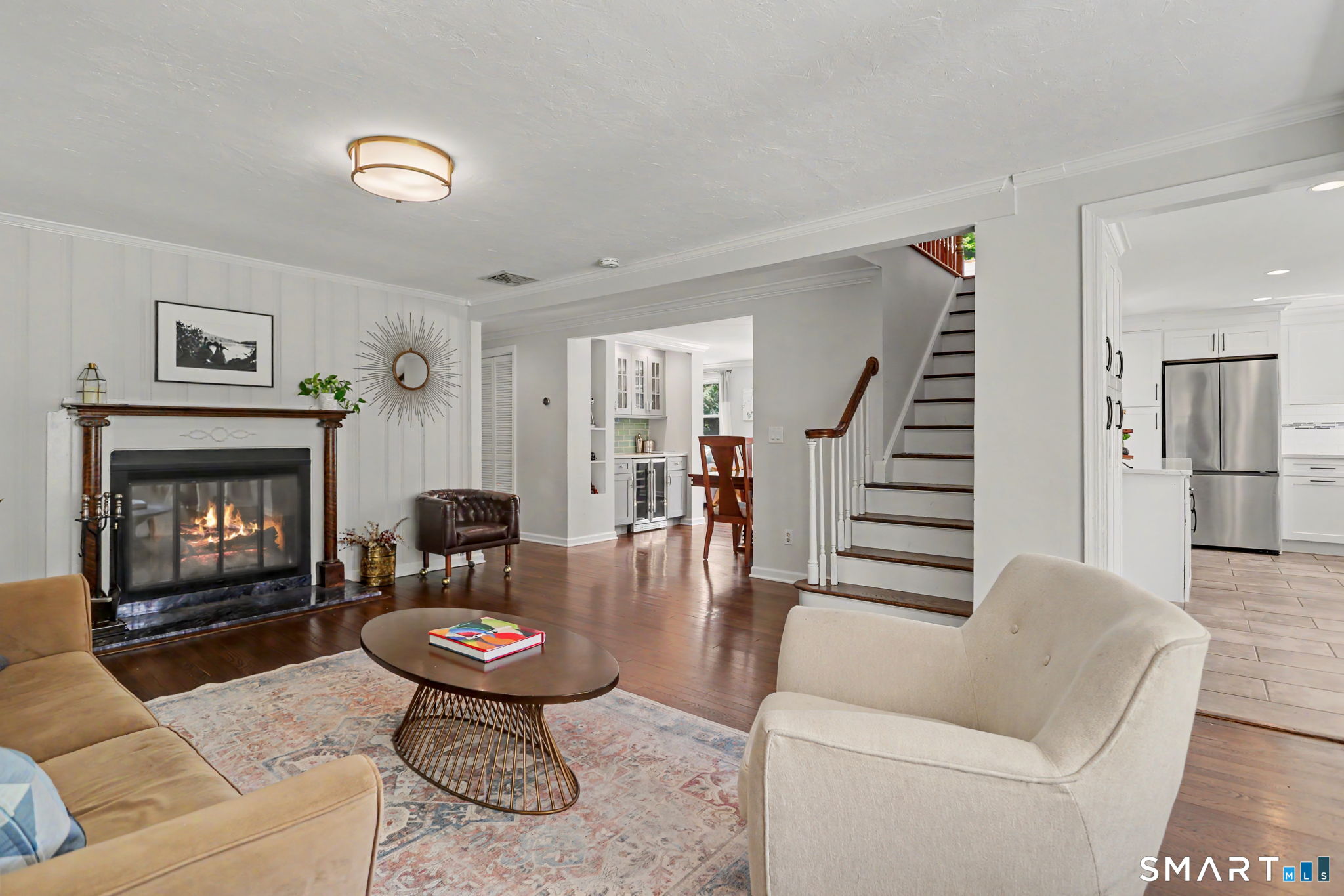 2 Rising Road Norwalk, CT 06850 - Photo 5 of 33 a living room with furniture and a fireplace