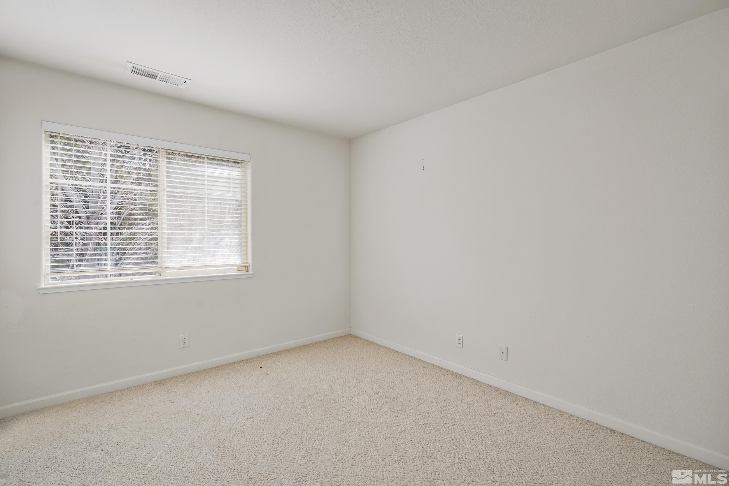 1270 Greenwich Way Reno, NV 89519 - Photo 17 of 20 an empty room with a window