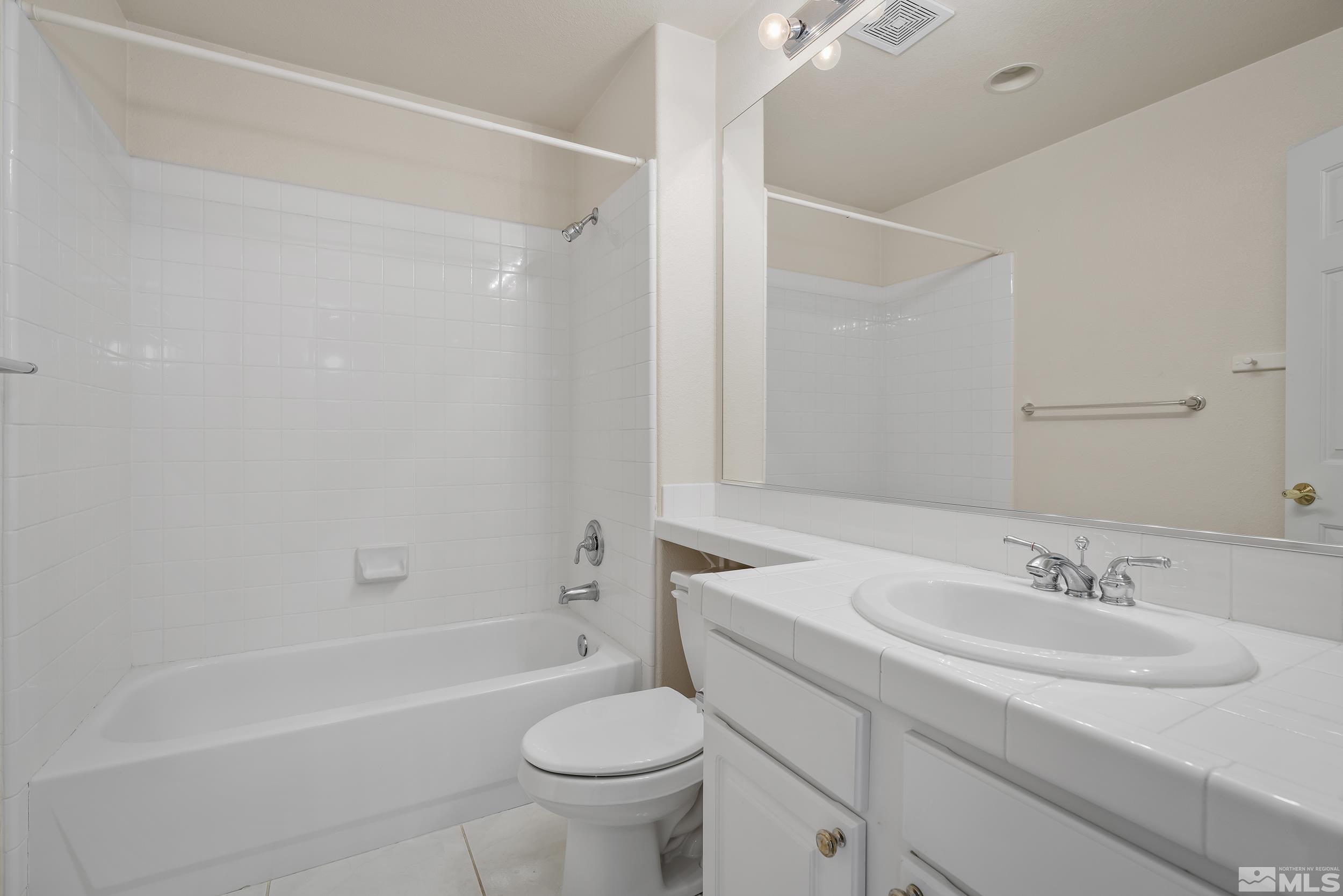 1270 Greenwich Way Reno, NV 89519 - Photo 18 of 20 a bathroom with a sink toilet and shower