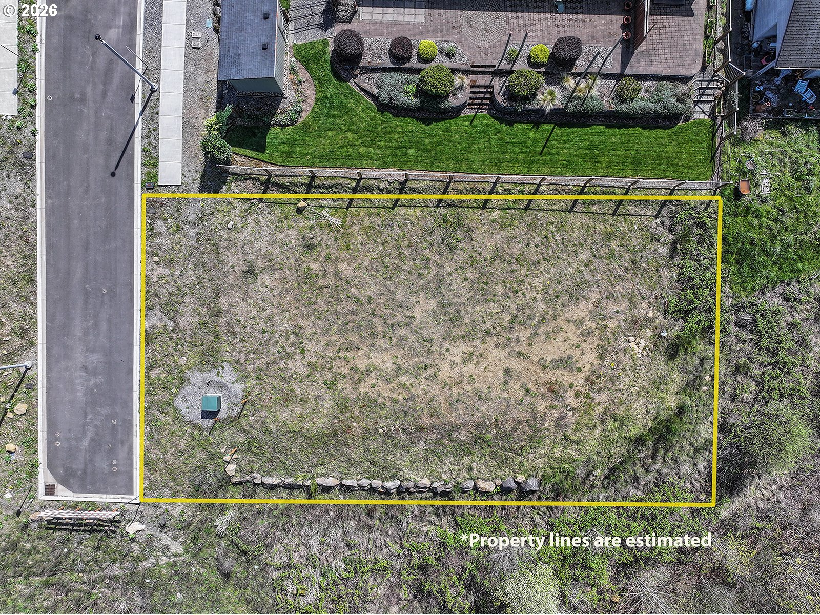 Manchester Drive Cascade Locks, OR 97014 - Photo 1 of 16 a view of a yard with wooden fence