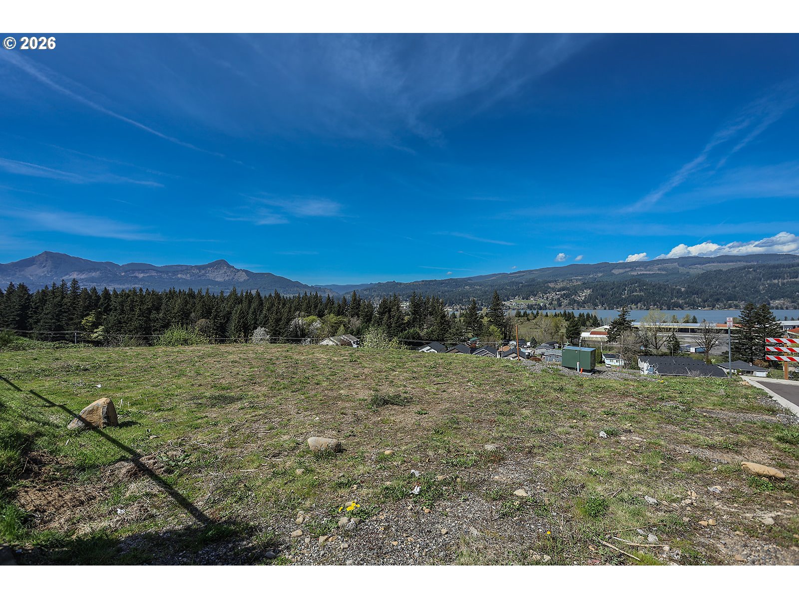 Manchester Drive Cascade Locks, OR 97014 - Photo 12 of 16 a view of a dry yard with trees
