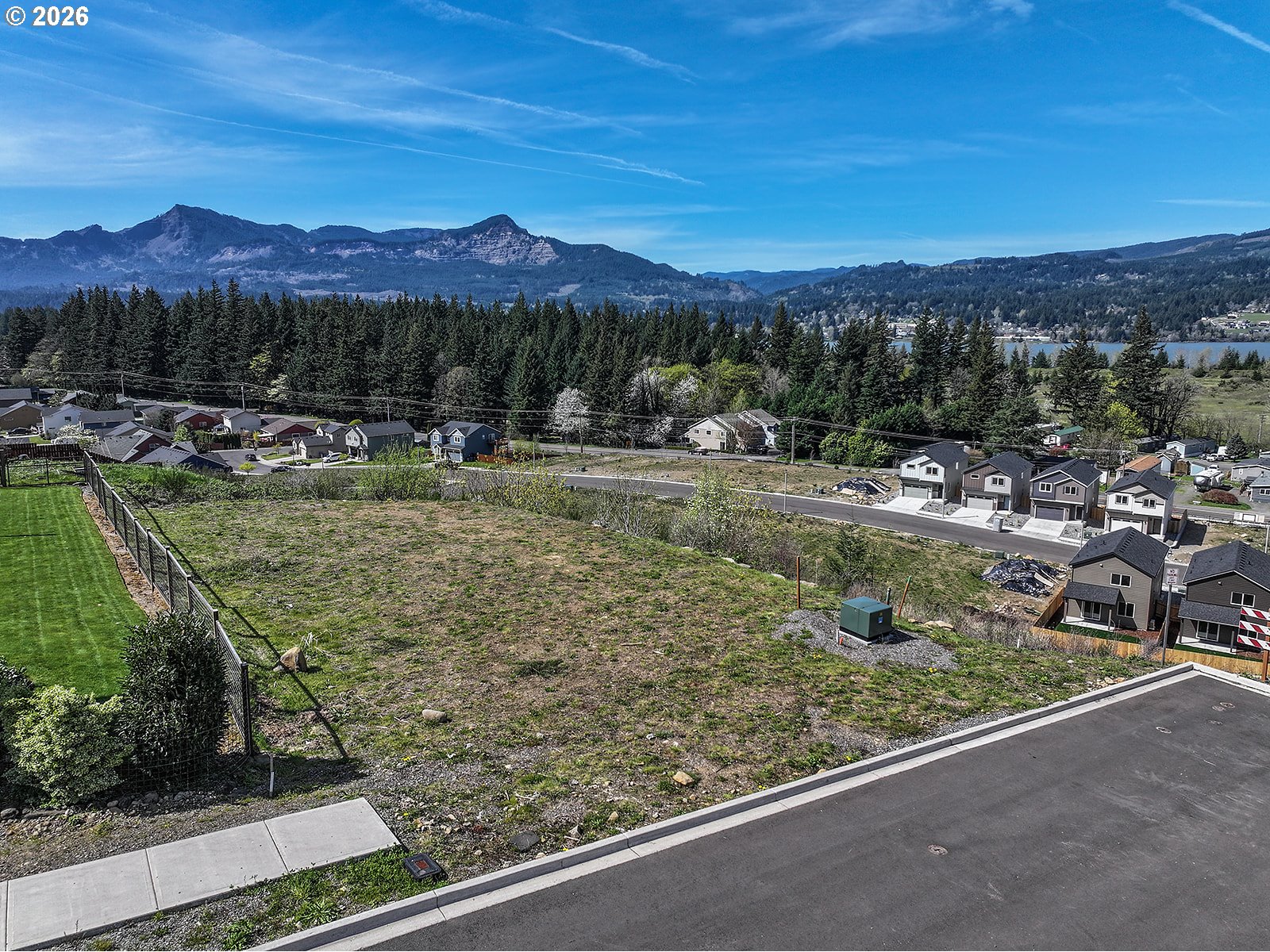 Manchester Drive Cascade Locks, OR 97014 - Photo 2 of 16 a view of a garden with a houses