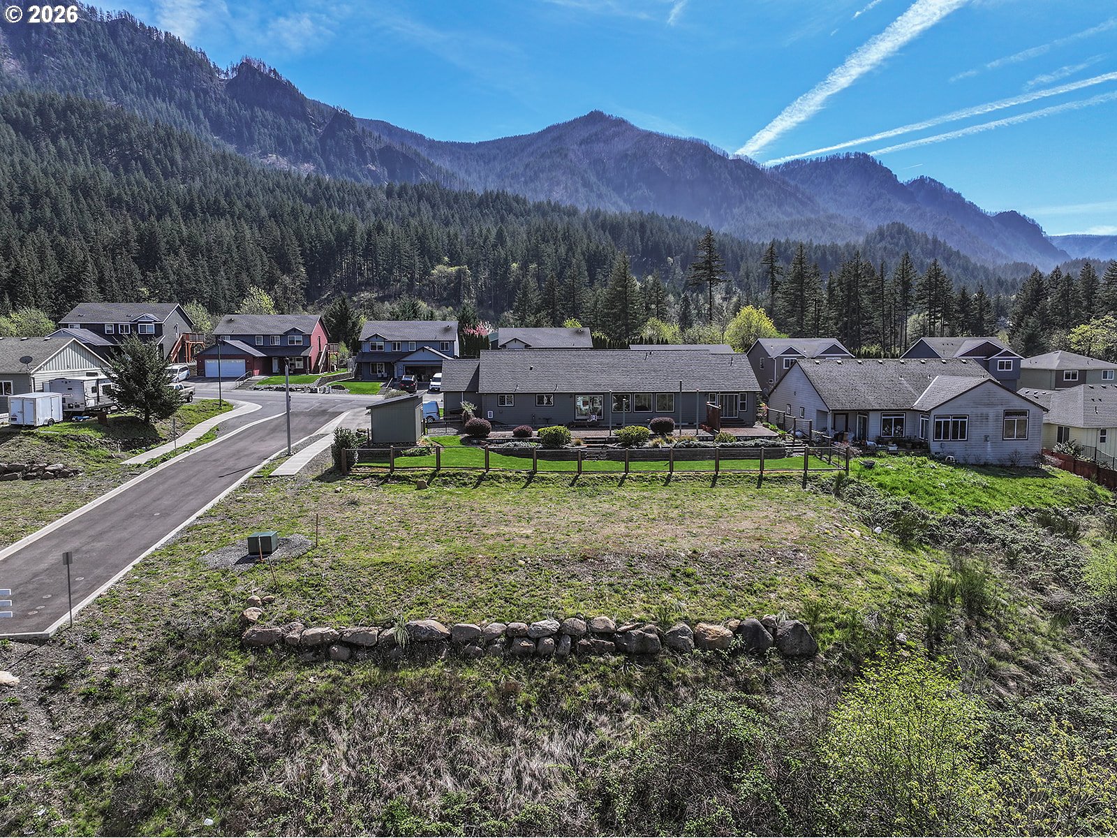 Manchester Drive Cascade Locks, OR 97014 - Photo 4 of 16 a view of a house with a yard