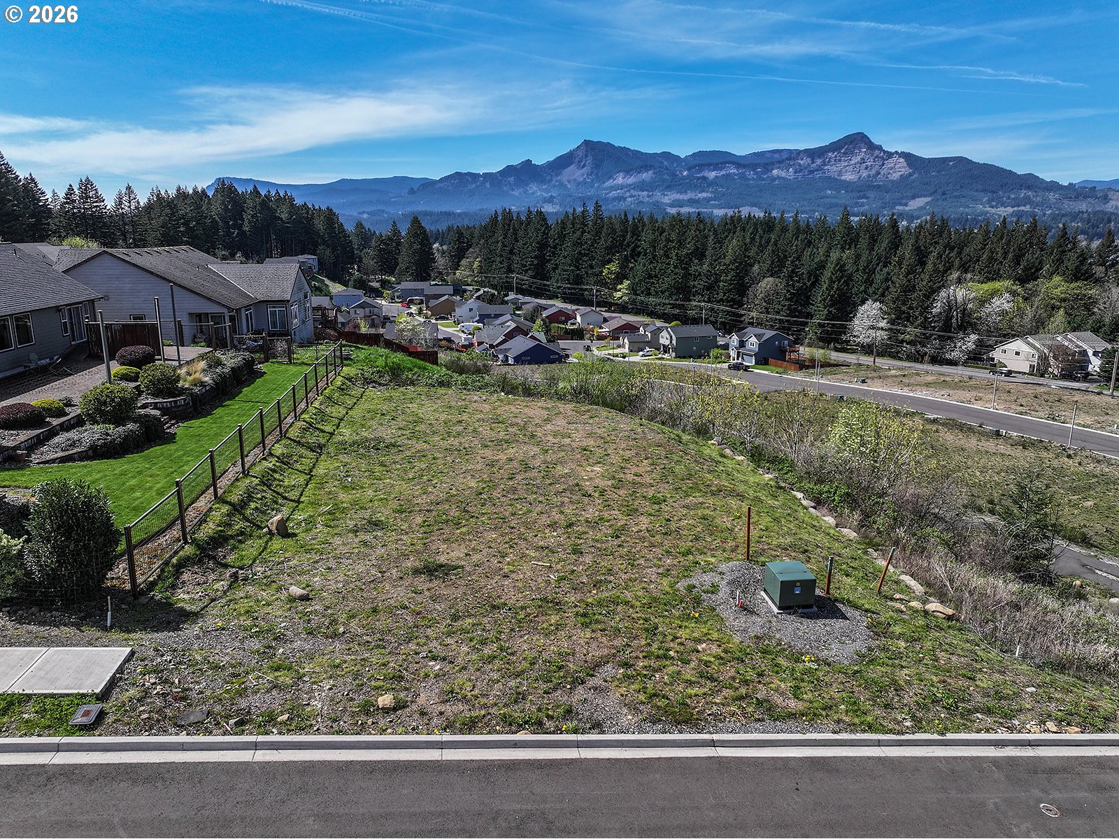 Manchester Drive Cascade Locks, OR 97014 - Photo 7 of 16 a view of a city with a yard