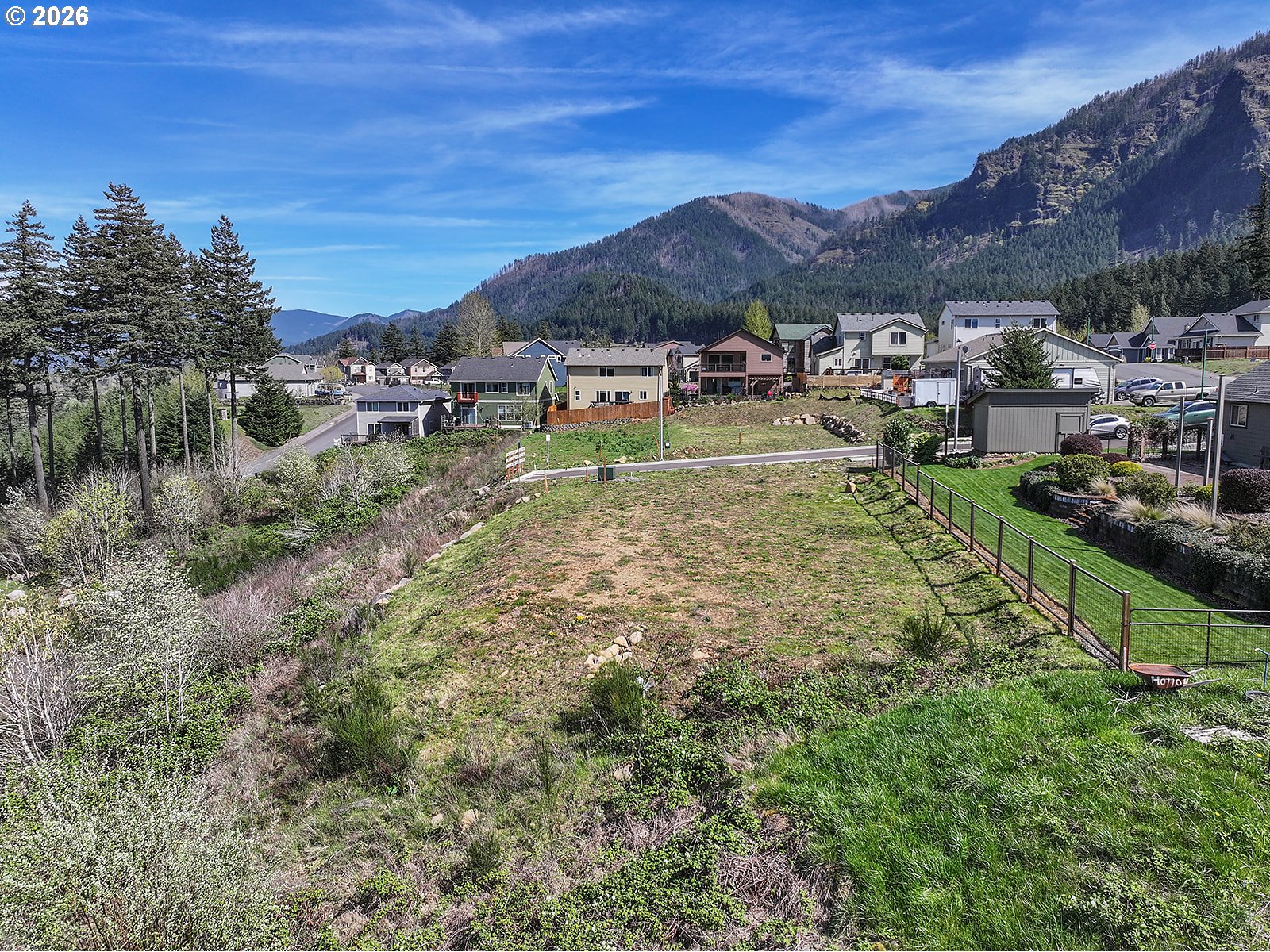 Manchester Drive Cascade Locks, OR 97014 - Photo 9 of 16 a view of residential houses with outdoor space and seating