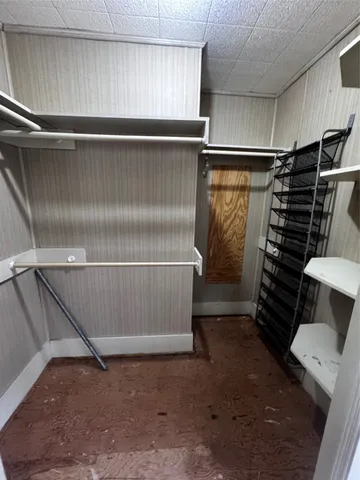 a view of a livingroom with a staircase